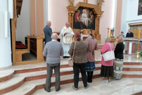 Z�o�enie pod mens�, tulei z dokumentami ko�cio�a